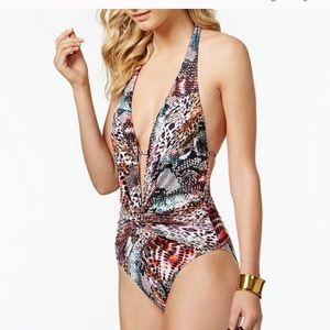 Kenneth Cole plunge neckline one piece swimsuit.